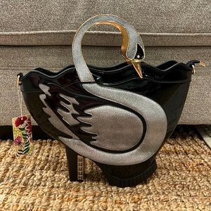 Boutique purse. Black, silver, gold with tags.